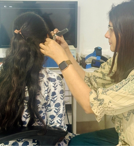 ENT Specialist Navi Mumbai Dr Archana Jhawar, checking ear