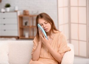 warm compress over the ear for ear pain relief