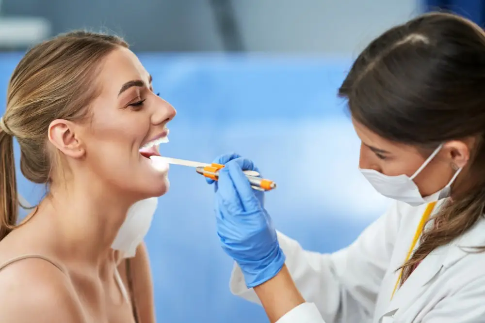 Medical professional examining a patient.